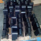 CNC machined S355 steel brackets manufactured in series production with black oxide surface treatment